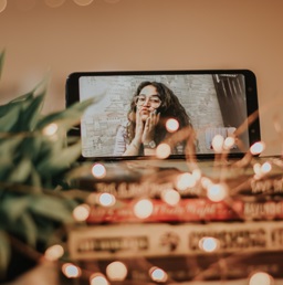 A photo of a woman in a video call